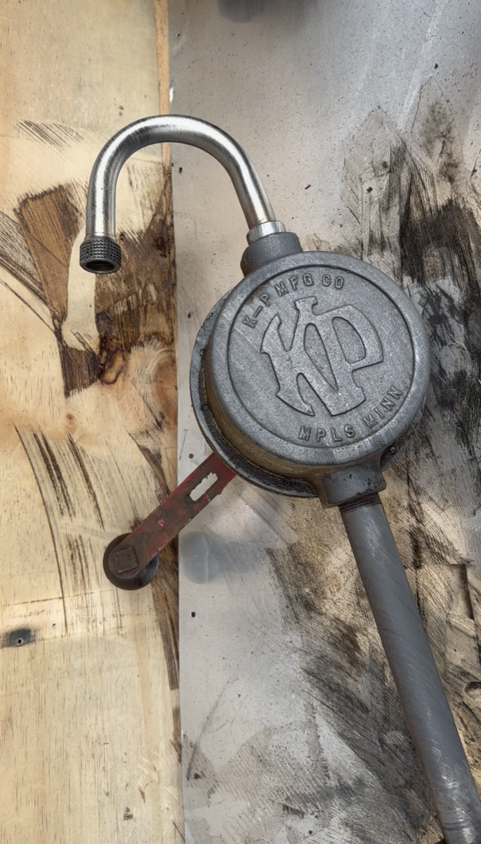 Vintage K-P barrel pump — laser cleaning in progress