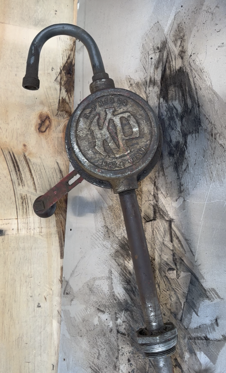 Vintage K-P barrel pump before laser cleaning