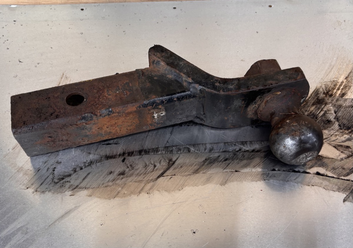 Rusted trailer hitch before laser cleaning