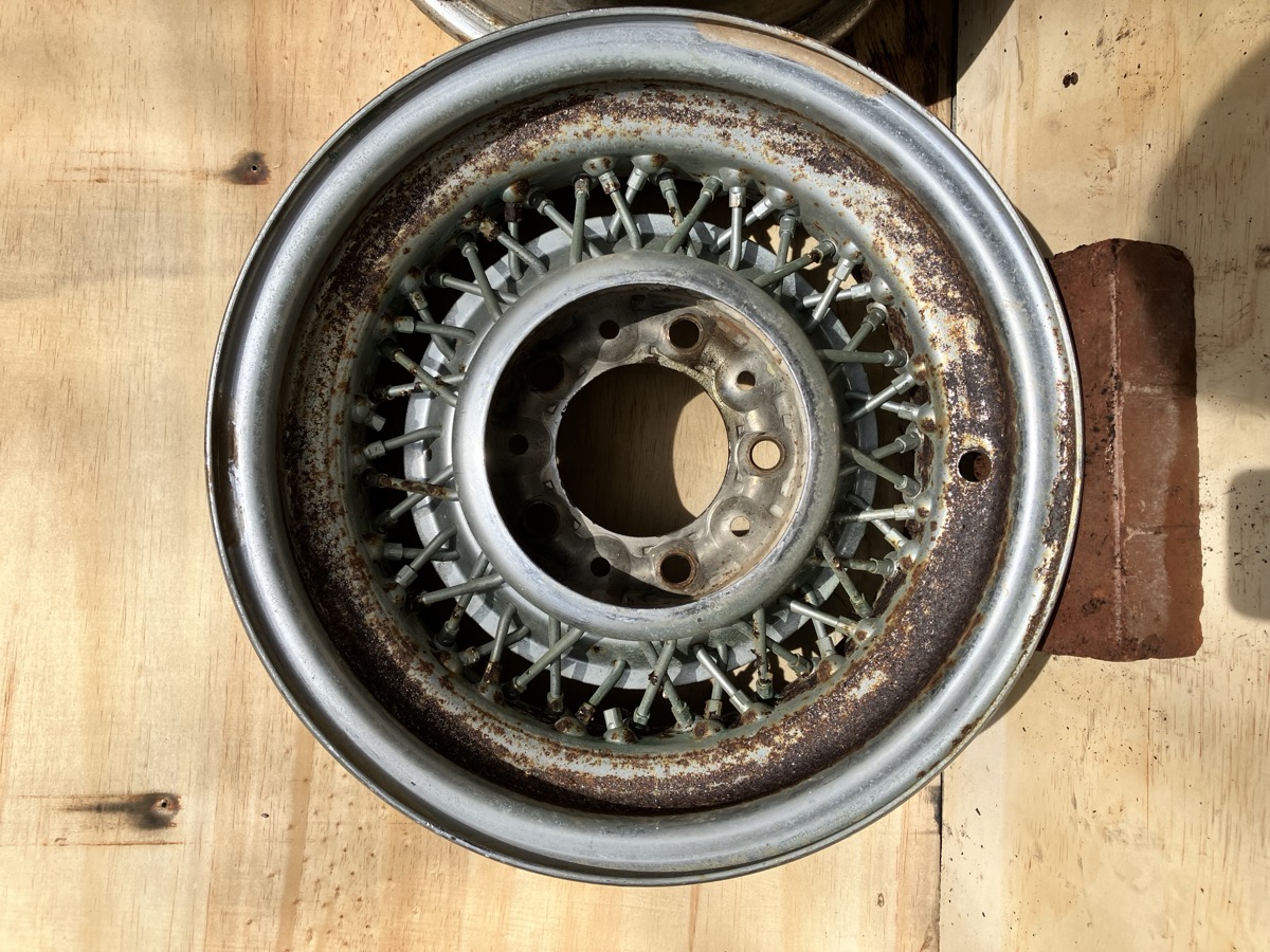 Rusted Chrysler Kelsey-Hayes wire wheel before laser cleaning